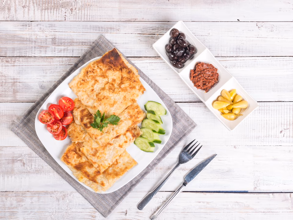 Gozleme Feast Box — Turkish gozleme breakfast spread with fresh vegetables